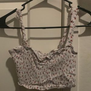 Shein cropped rose shirt. Stretchy. The size is a small.